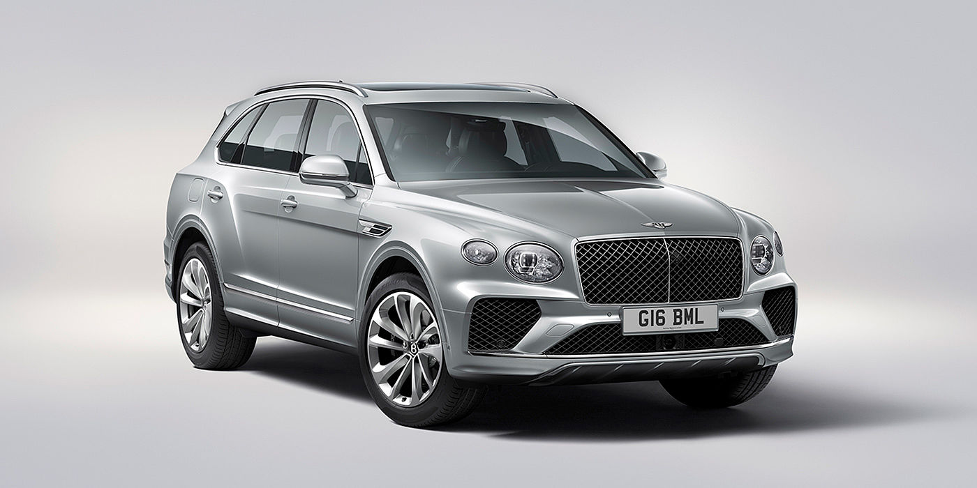 Bentley Polanco Bentley Bentayga in Moonbeam paint, front three-quarter view, featuring a matrix grille and elliptical LED headlights.