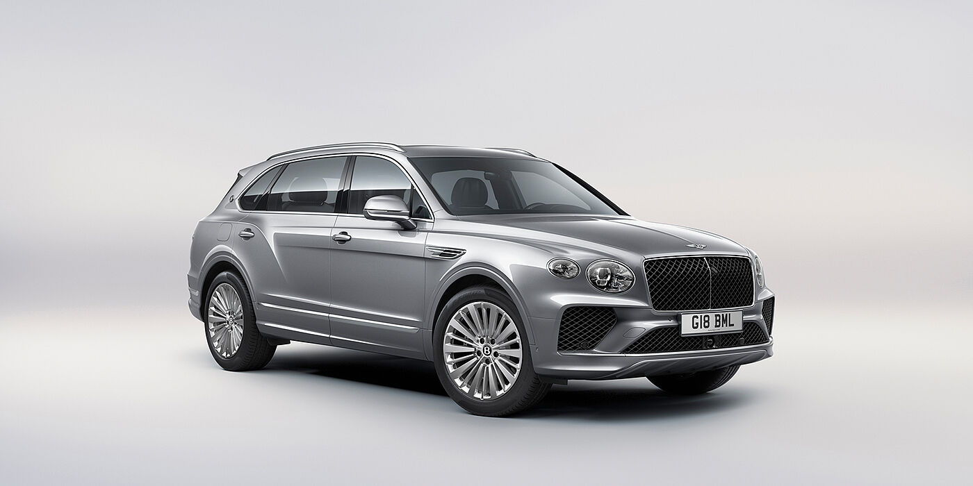 Bentley Polanco Bentley Bentayga Extended Wheelbase luxury SUV front three quarter view in Moonbeam paint with 21 inch five spoke painted wheels