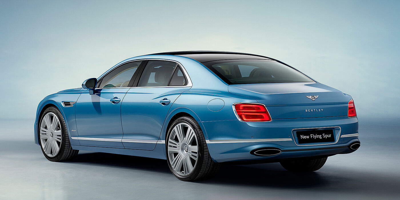 Bentley Polanco New Bentley Flying Spur Azure sedan rear view in Light windsor blue by Mulliner paint with 22 inch Azure wheels and chrome exterior details