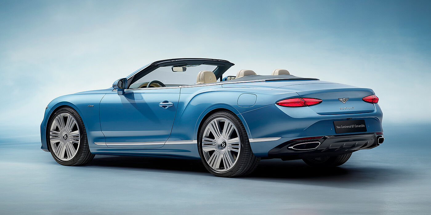 Bentley Polanco New Bentley Continental GTC Azure convertible rear view in Light Windsor blue paint with 22 inch ten spoke wheels and chrome exterior details