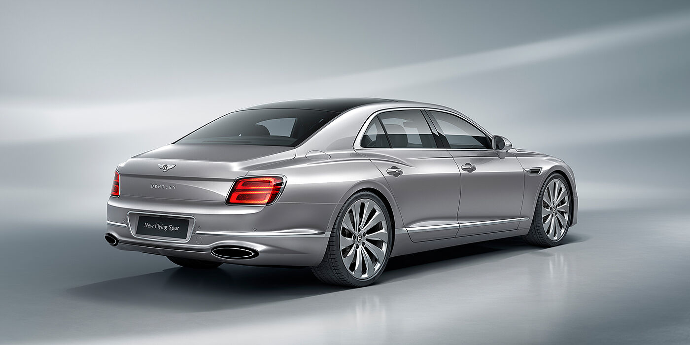 Bentley Polanco New Bentley Flying Spur sedan rear view in Silverlake paint with ten spoke wheels and chrome matrix grille