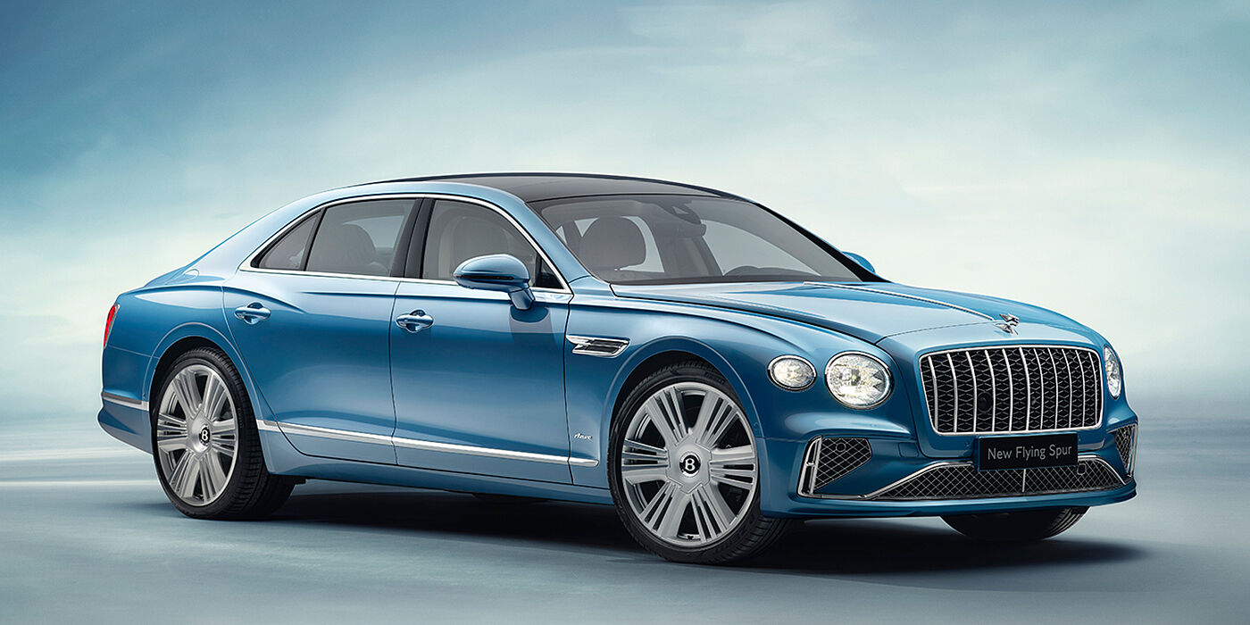 Bentley Polanco New Bentley Flying Spur Azure sedan front view in Light windsor blue by Mulliner paint with 22 inch Azure wheels and chrome exterior details
