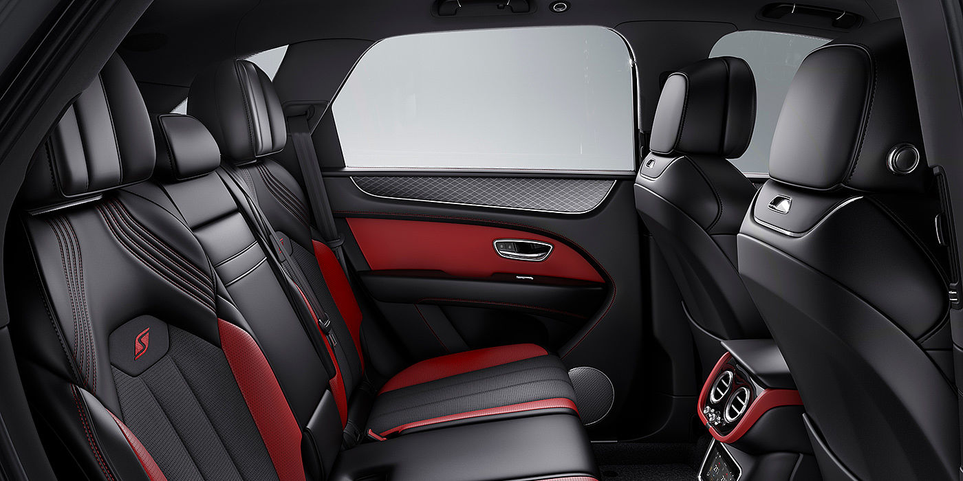 Bentley Polanco Bentey Bentayga S interior view for rear passengers with Beluga black and Hotspur red coloured hide.