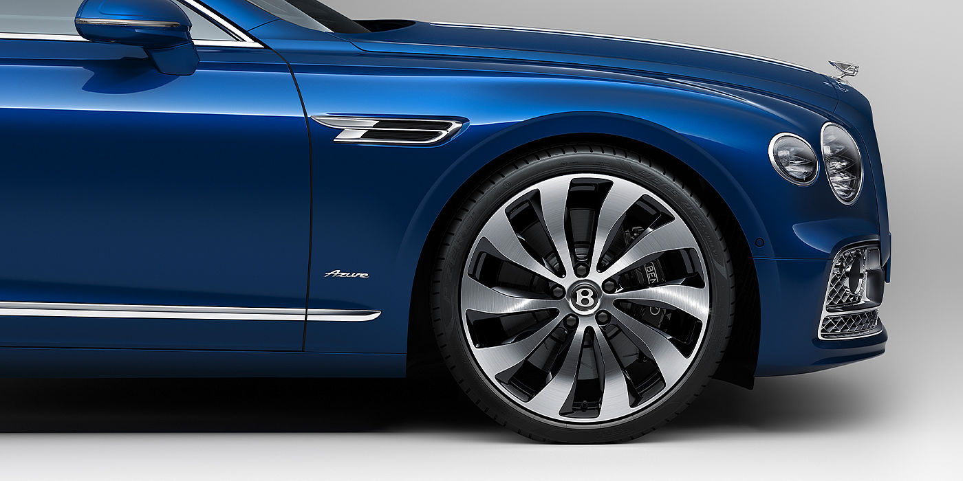 Bentley Polanco Bentley Flying Spur Azure sedan side close up in Sequin Blue paint with Azure badge
