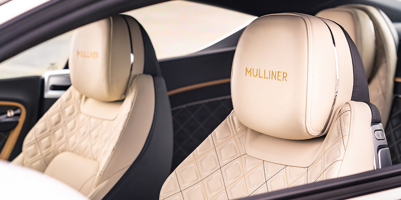 Bentley Polanco Bentley Continental GT Mulliner coupe seat detail in Beluga black and Linen hide